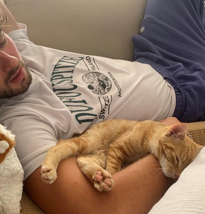 Elliot cuddling with his family